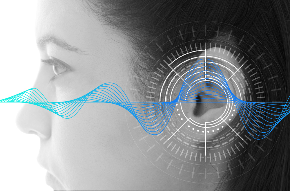 Sideview of woman's head with graphic over ear
